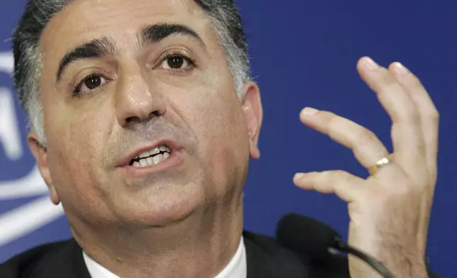 FILE - Reza Pahlavi, the son of Iran's toppled Shah Mohammad Reza Pahlavi, holds a news conference in Paris on June 7, 2006. (AP Photo/Jacques Brinon, File)