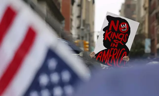 Demonstrators march down Fifth Avenue during the "No Kings" protest, Saturday, June 14, 2025, in New York. (AP Photo/Stefan Jeremiah)
