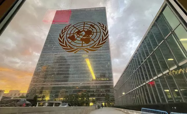 FILE -The United Nations headquarters building is seen from inside the General Assembly hall, Sept. 21, 2021, during the 76th Session of the U.N. General Assembly in New York. (Eduardo Munoz/Pool Photo via AP, File)