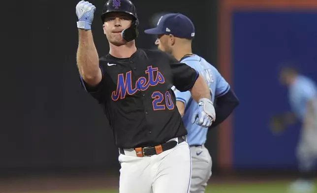 New York Mets' Pete Alonso celebrates after hitting a double during the fourth inning of a baseball game against the Tampa Bay Rays Friday, June 13, 2025, in New York. (AP Photo/Frank Franklin II)