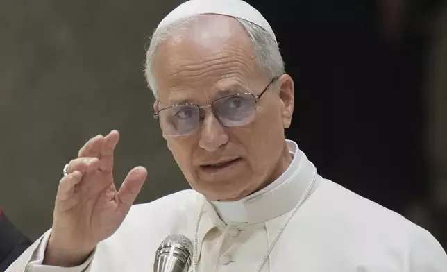 Pope Leo XIV meets the members of the Rome's local church in the Paul VI hall at the Vatican, Thursday, June 12, 2025. (AP Photo/Andrew Medichini)