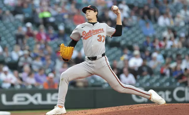 Baltimore Orioles starting pitcher Cade Povich throws during the fifth inning of a baseball game against the Seattle Mariners, Wednesday, June 4, 2025, in Seattle. (AP Photo/Jason Redmond)