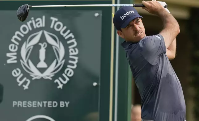 Nick Taylor hits from the 10th tee during the third round of the Memorial golf tournament Saturday, May 31, 2025, in Dublin, Ohio. (AP Photo/Sue Ogrocki)