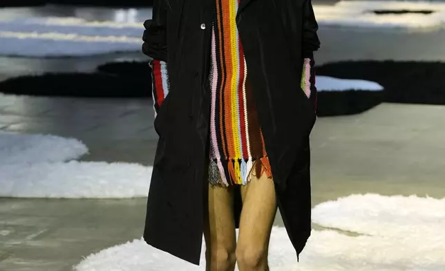 A model wears a creation as part of the men's Prada Spring-Summer 2026 collection, that was presented in Milan, Italy, Sunday, June 22, 2025. (AP Photo/Luca Bruno)