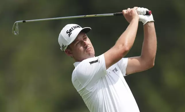 Andrew Putnam hits from the ninth tee during the first round of the Rocket Classic golf tournament at the Detroit Golf Club, Thursday, June 26, 2025, in Detroit. (AP Photo/Paul Sancya)