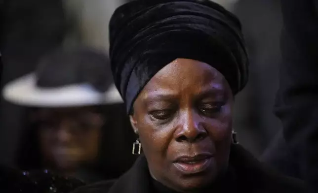 Esther Lungu, widow of Zambia's former President Edgar Lungu, attends a Mass, at the Cathedral of Christ the King, in Johannesburg, South Africa, Wednesday, June 25, 2025. (AP Photo/Themba Hadebe)