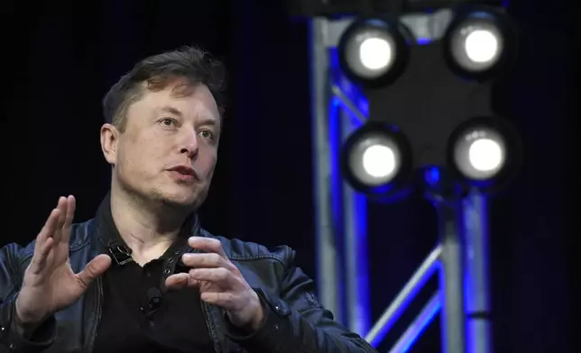 FILE - Tesla and SpaceX Chief Executive Officer Elon Musk speaks at the SATELLITE Conference and Exhibition in Washington, March 9, 2020. (AP Photo/Susan Walsh, File)