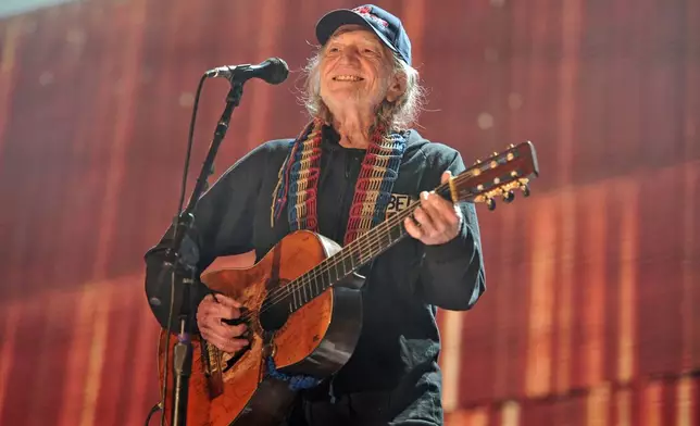 FILE - Willie Nelson performs at Farm Aid 30 in Chicago on Sept. 19, 2015. (Photo by Rob Grabowski/Invision/AP, File)