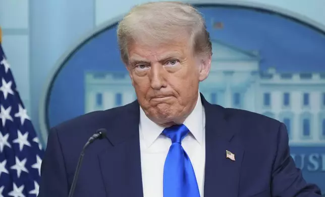 President Donald Trump listens during a briefing with the media, Friday, June 27, 2025, at the White House in Washington. (AP Photo/Jacquelyn Martin)