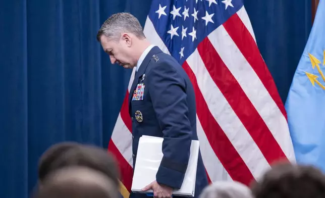 Joint Chiefs Chairman Gen. Dan Caine steps away from the podium following a news conference at the Pentagon, Thursday, June 26, 2025 in Washington. (AP Photo/Kevin Wolf)