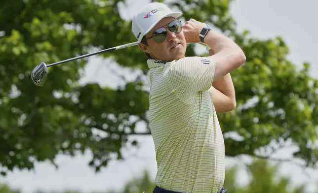 Ben Griffin hits from the fifth tee during the final round of the Memorial golf tournament Sunday, June 1, 2025, in Dublin, Ohio. (AP Photo/Sue Ogrocki)