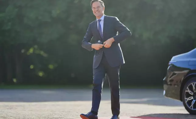 NATO Secretary General Mark Rutte arrives ahead of a formal dinner at the Paleis Huis ten Bosch ahead of the NATO summit in The Hague, Netherlands, Tuesday, June 24, 2025. (AP Photo/Markus Schreiber)