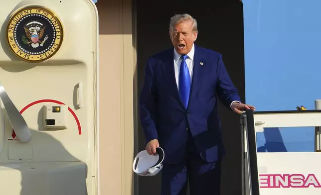 President Donald Trump arrives at Amsterdam Schiphol Airport ahead of the NATO summit, taking place in The Hague, Netherlands, Tuesday, June 24, 2025. (AP Photo/Peter Dejong)