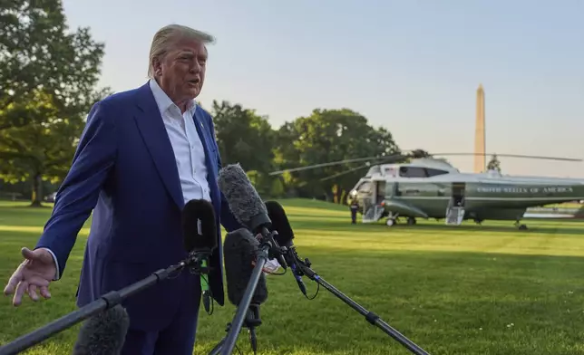 President Donald Trump speaks with reporters before boarding Marine One on the South Lawn of the White House, Tuesday, June 24, 2025, in Washington. (AP Photo/Evan Vucci)