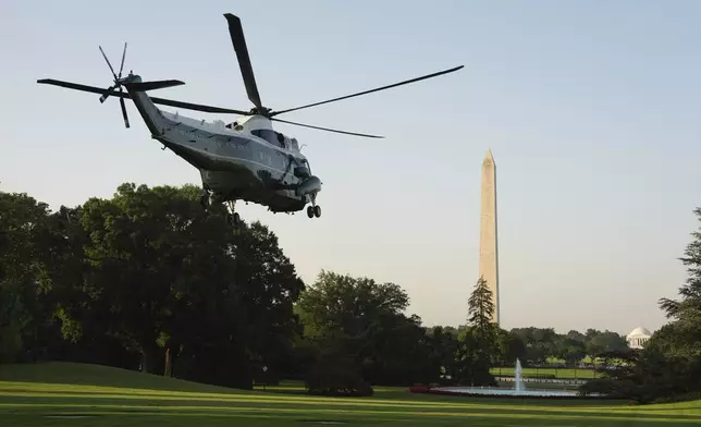 Marine One, with President Donald Trump aboard, lifts off the South Lawn of the White House, Tuesday, June 24, 2025. Trump is on his way to The Hague, to join world leaders gathering in the Netherlands for a two-day NATO summit. The Washington Monument stands right. (AP Photo/Evan Vucci)
