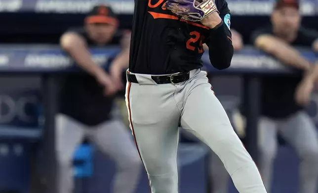 Baltimore Orioles third base Ramón Urías throws out Tampa Bay Rays' Josh Lowe on a close play during the second inning of a baseball game Monday, June 16, 2025, in Tampa, Fla. (AP Photo/Chris O'Meara)