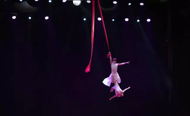 Acrobats from Dongchoon Circus Troupe, South Korea's last-remaining circus, perform in Ansan, South Korea, Sunday, June 15, 2025. (AP Photo/Lee Jin-man)