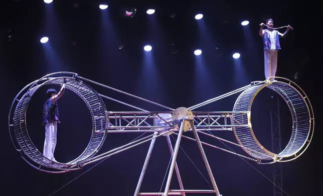 Acrobats from Dongchoon Circus Troupe, South Korea's last-remaining circus, perform in Ansan, South Korea, Wednesday, June 11, 2025. (AP Photo/Lee Jin-man)