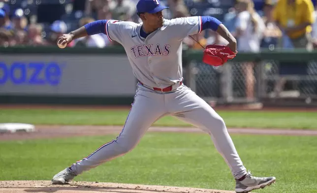 Texas Rangers pitcher Kumar Rocker delivers during the first inning of a baseball game against the Pittsburgh Pirates in Pittsburgh, Saturday, June 21, 2025. (AP Photo/Gene J. Puskar)