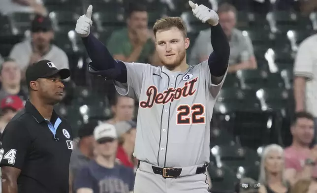 Detroit Tigers' Parker Meadows celebrates after hitting a triple during the sixth inning of a baseball game against the Chicago White Sox in Chicago, Monday, June 2, 2025. (AP Photo/Nam Y. Huh)