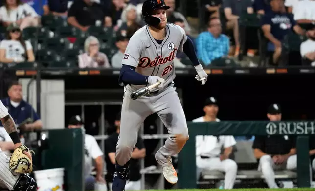 Detroit Tigers' Parker Meadows runs after hitting a triple during the sixth inning of a baseball game against the Chicago White Sox in Chicago, Monday, June 2, 2025. (AP Photo/Nam Y. Huh)