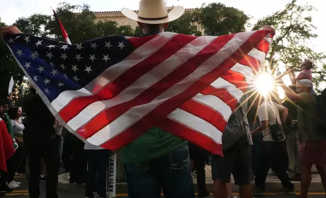Anti ICE protesters march in downtown San Antonio, Wednesday, June 11, 2025. (AP Photo/Eric Gay)