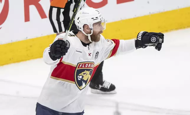 Florida Panthers' Sam Bennett (9) celebrates after a goal against the Edmonton Oilers during the first period in Game 5 of the NHL hockey Stanley Cup Final in Edmonton, Alberta, Saturday, June 14, 2025. (Jason Franson/The Canadian Press via AP)