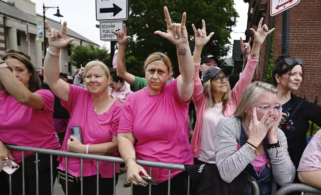 Supporters of Karen Read, react as she leaves the courthouse at the start of the third day of jury deliberations in Read's trial at Norfolk Superior Court, Wednesday, June 18, 2025, in Dedham, Mass. (AP Photo/Josh Reynolds)