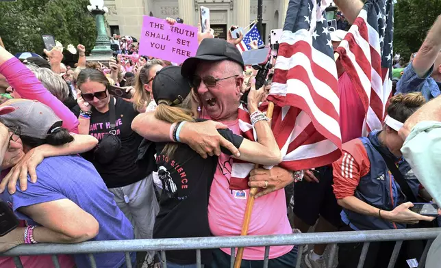 Supporters of Karen Read react after she was found not guilty of second-degree murder on Wednesday, June 18, 2025, in Dedham, Mass. (AP Photo/Josh Reynolds)