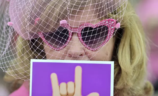 Lucy, a Karen Read supporter, gathers outside the courthouse at the start of the third day of jury deliberations in Read's trial at Norfolk Superior Court, Wednesday, June 18, 2025, in Dedham, Mass. (AP Photo/Josh Reynolds)