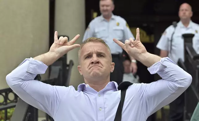 Blogger Aidan Kearney leaves the courthouse after Karen Read was found not guilty of second-degree murder on Wednesday, June 18, 2025, in Dedham, Mass. (AP Photo/Josh Reynolds)