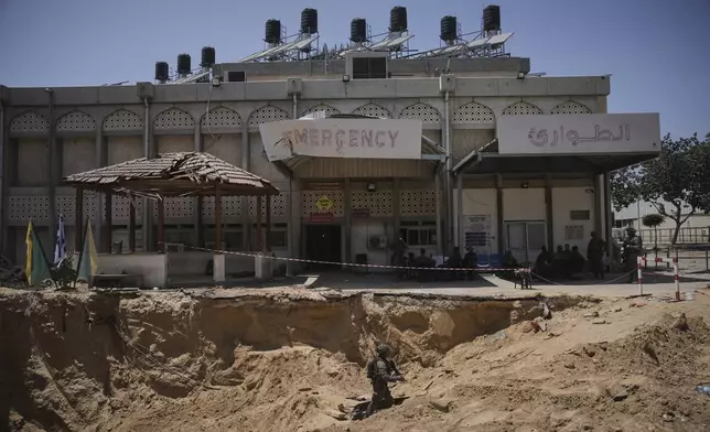 Israeli soldiers take up position at the European Hospital in Khan Younis, southern Gaza, where the military claims that Hamas militants operated in a tunnel beneath the facility, on Sunday, June 8, 2025. (AP Photo/Ohad Zwigenberg)