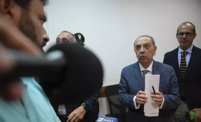 Prosecutor Francesco Lo Voi leaves after a news conference in Rome, on Friday, June 13, 2025, about the case of a baby girl and mother found dead in Rome's Villa Pamphili park. (AP Photo/Alessandra Tarantino)