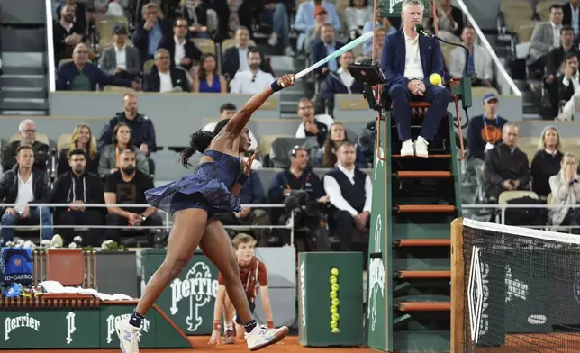 Coco Gauff of the U.S. plays a shot against France's Lois Boisson during their semifinal match of the French Tennis Open at the Roland-Garros stadium in Paris, Thursday, June 5, 2025. (AP Photo/Lindsey Wasson)