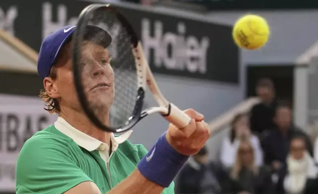 Italy's Jannik Sinner plays a shot against Serbia's Novak Djokovic during their semifinal match of the French Tennis Open at the Roland-Garros stadium in Paris, Friday, June 6, 2025. (AP Photo/Thibault Camus)