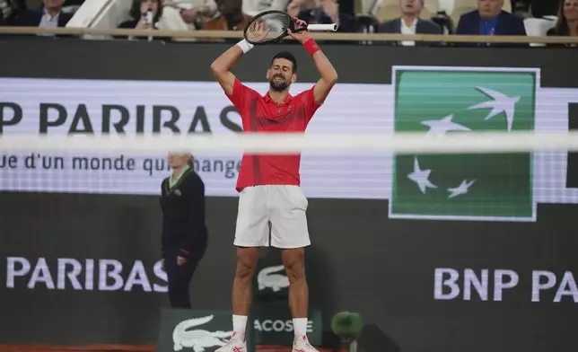 Serbia's Novak Djokovic reacts during the semifinal match of the French Tennis Open against Italy's Jannik Sinner at the Roland-Garros stadium in Paris, Friday, June 6, 2025. (AP Photo/Lindsey Wasson)