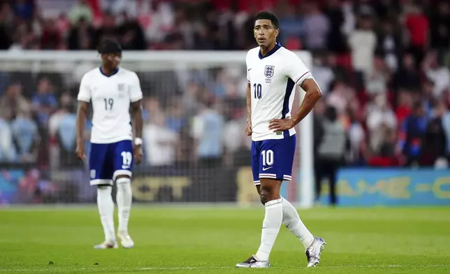 England's Jude Bellingham (10) reacts after Senegal's Cheikh Sabaly scores their side's third goal of the game after an international friendly match at The City Ground in Nottingham, England, Tuesday, June 10, 2025. (Mike Egerton/PA via AP)