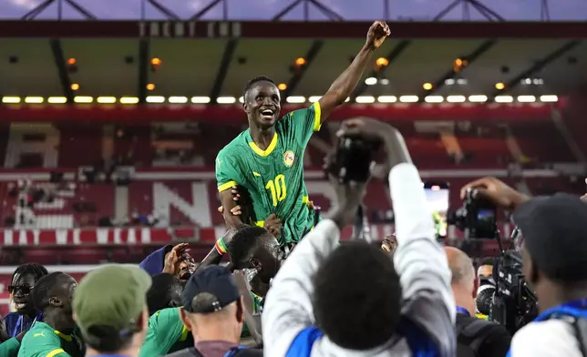 Senegal's Cheikh Sabaly celebrates following an international friendly match against England at The City Ground in Nottingham, England, Tuesday, June 10, 2025. (Nick Potts/PA via AP)