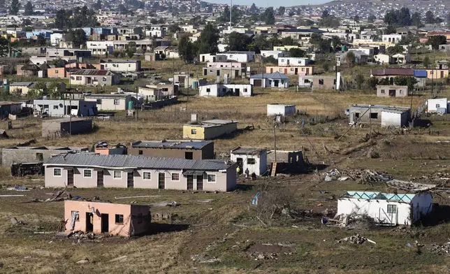Flood-damaged housing in Mthatha, South Africa, Friday, June 13, 2025. (AP Photo/Themba Hadebe)