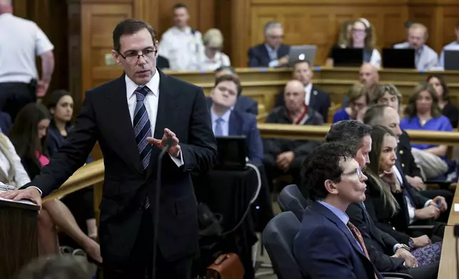 Prosecutor Hank Brennan, left, speaks to jurors during closing arguments in the murder trial of Karen Read in Norfolk Superior Court, Friday, June 13, 2025, in Dedham, Mass. (Mark Stockwell/The Sun Chronicle via AP, Pool)