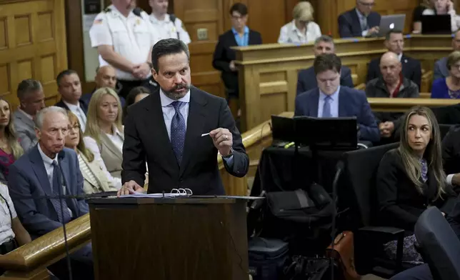 Defense attorney Alan Jackson speaks to jurors during closing arguments in the murder trial of Karen Read, at right, in Norfolk Superior Court, Friday, June 13, 2025, in Dedham, Mass. (Mark Stockwell/The Sun Chronicle via AP, Pool) /// [EXTERNAL]