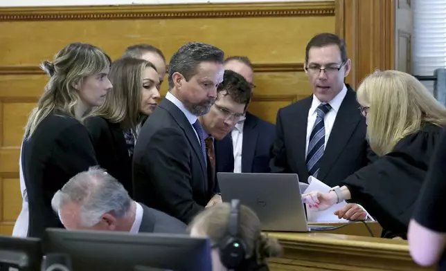 Defendant Karen Read, second from left, defense attorneys and prosecutors meet at side bar with Judge Beverly Cannone, right, before closing arguments during the murder trial of Karen Read in Norfolk Superior Court, Friday, June 13, 2025, in Dedham, Mass. (Mark Stockwell/The Sun Chronicle via AP, Pool) /// [EXTERNAL]