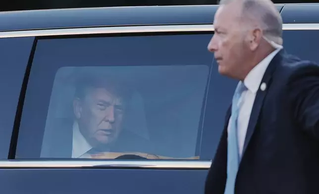President Donald Trump arrives for a formal dinner at the Paleis Huis ten Bosch ahead of the NATO summit in The Hague, Netherlands, Tuesday, June 24, 2025. (AP Photo/Markus Schreiber)