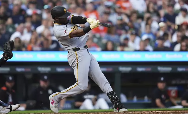 Pittsburgh Pirates' Alexander Canario hits a two-run single against the Detroit Tigers in the third inning during a baseball game, Tuesday, June 17, 2025, in Detroit. (AP Photo/Paul Sancya)