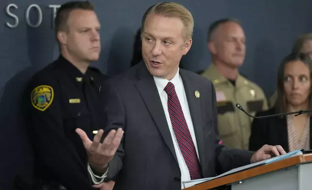 Bureau of Criminal Apprehension Supervisor Drew Evans speaks during a news conference at the Hennepin County Attorney’s Office in Minneapolis, Monday, June 16, 2025. (AP Photo/George Walker IV)