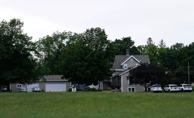The home of shooting suspect Vance Boelter is seen Sunday, June 15, 2025, in Green Isle, Minn. (AP Photo/George Walker IV)