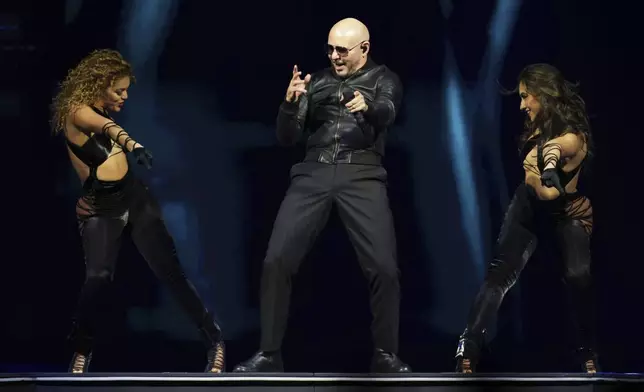 Pitbull performs in concert on Monday, June 9, 2025, in London.(Photo by Scott A Garfitt/Invision/AP)