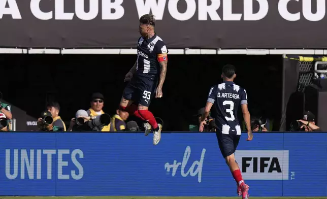Monterrey's Sergio Ramos, left, celebrates with Gerardo Arteaga after scoring the opening goal during the Club World Cup group E soccer match between CF Monterrey and Inter Milan in Pasadena, Calif., Tuesday, June 17, 2025. (AP Photo/Mark J. Terrill)