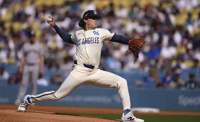 Los Angeles Dodgers starting pitcher Landon Knack throws to the plate during the first inning of a baseball game against the New York Yankees, Saturday, May 31, 2025, in Los Angeles. (AP Photo/Mark J. Terrill)