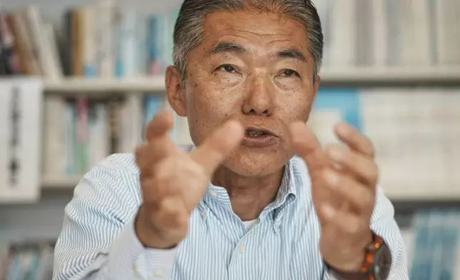 Masashi Funabara, a retired city hall employee and a "hidden" Christian speaks during an interview in the Ikitsuki Island Museum "Shima no Yakata" at Ikitsuki Island in Hirado, southern Japan, Sunday, April 27, 2025. (AP Photo/Eugene Hoshiko)